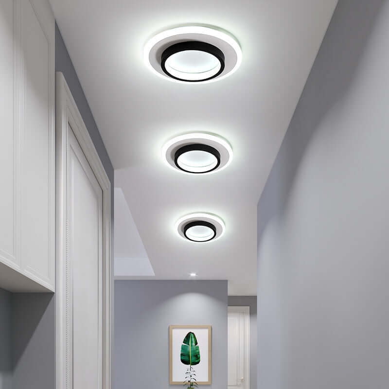 Surface-Mounted Ceiling Lamp providing elegant lighting in a modern hallway with sleek design and LED technology.