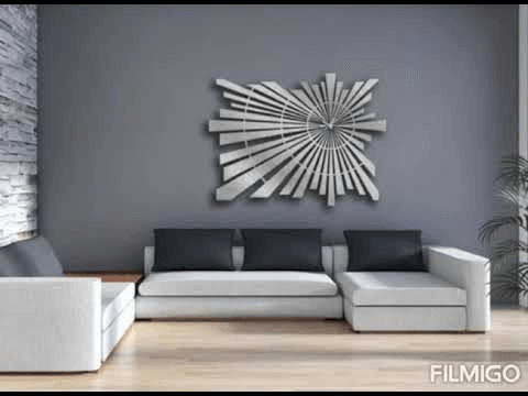 Modern living room with abstract Wall Decor art piece above a sleek white sectional sofa, adding style and sophistication to the space.