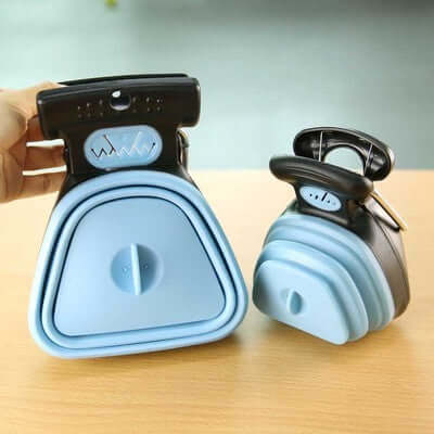 Foldable Dog Pooper Scooper – portable pet waste picker, easy and hygienic cleaning tool for walks, shown folded and unfolded on table.