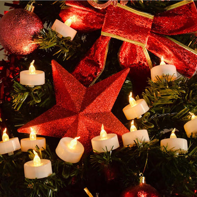 Electronic LED Candles add a flickering glow to a decorated Christmas tree, enhancing festive home decor with flameless tea lights.
