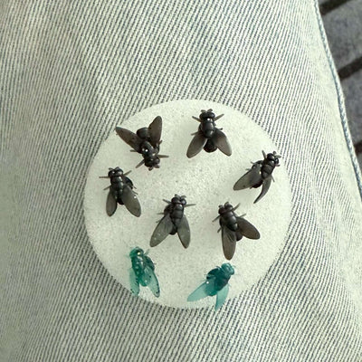Fly Simulation Earrings: Black & Blue color variants.