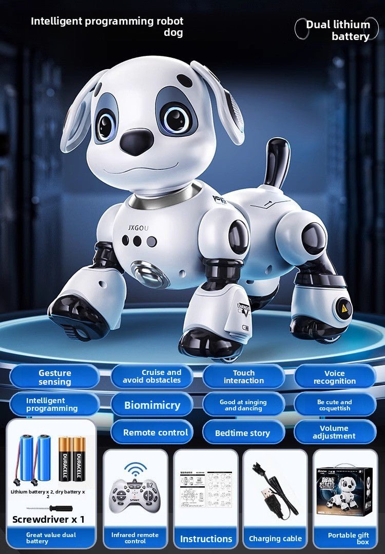 White and black intelligent robot dog toy with remote control, batteries, and charging cable.