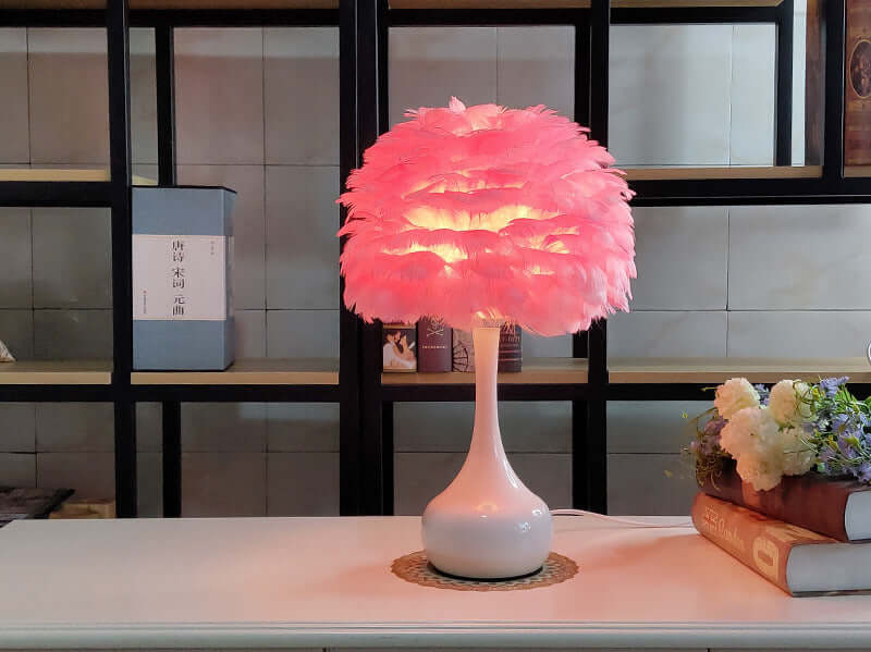 Luxury Feather Table Lamp with pink feather shade on a table, touch dimming bedside light for elegant home décor.