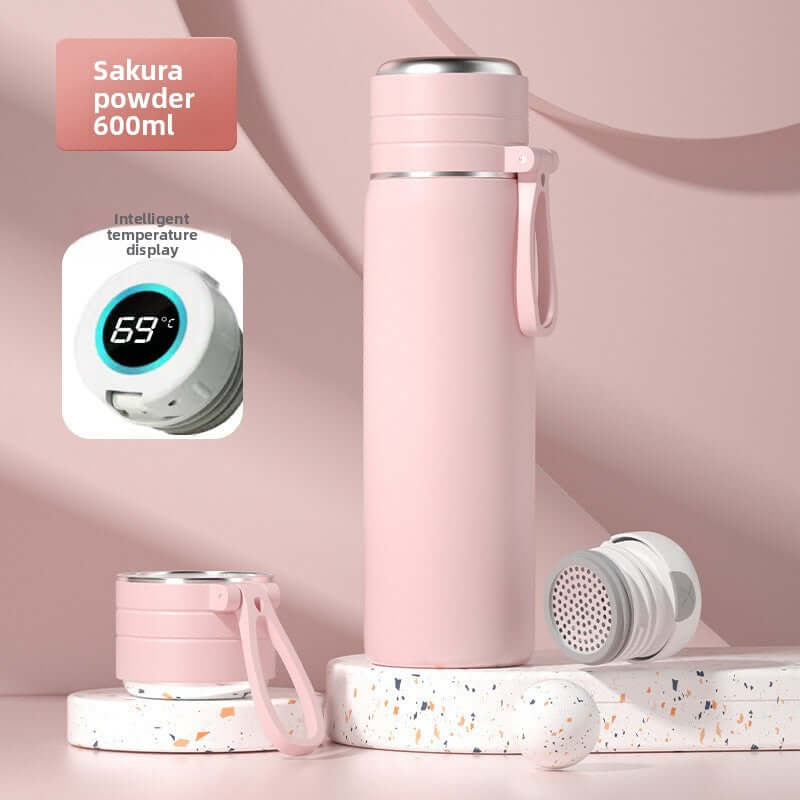 Sakura powder large capacity stainless steel water bottle 600ml with intelligent temperature display and tea strainer.