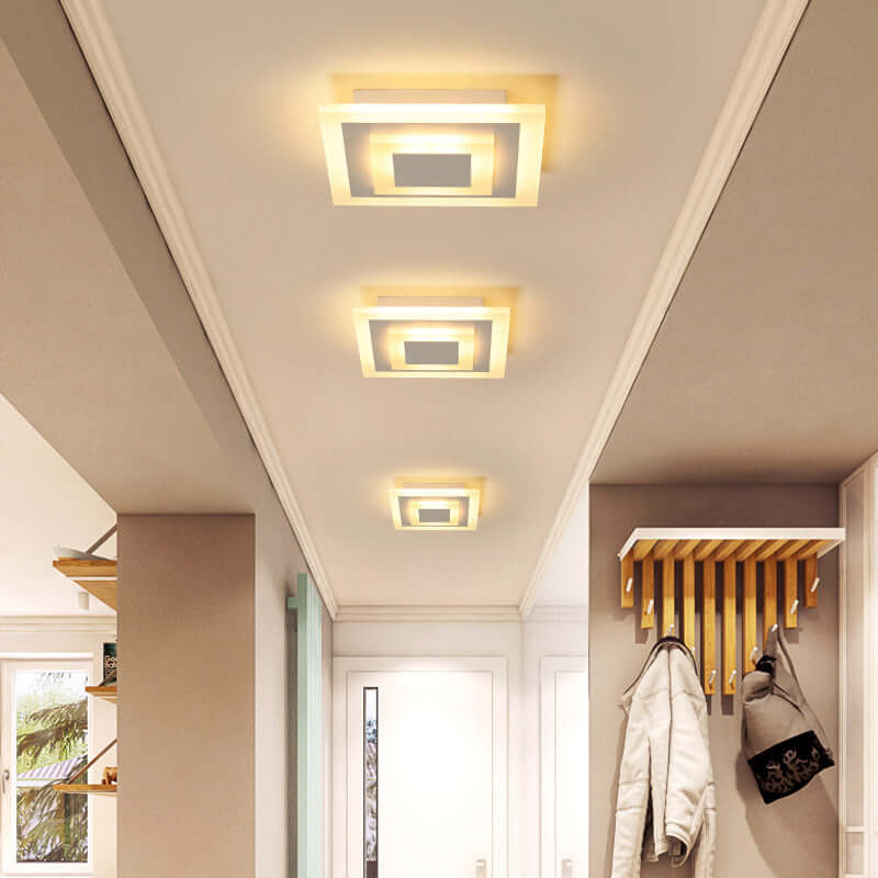 Surface-Mounted Ceiling Lamp providing elegant lighting in a modern hallway setting.