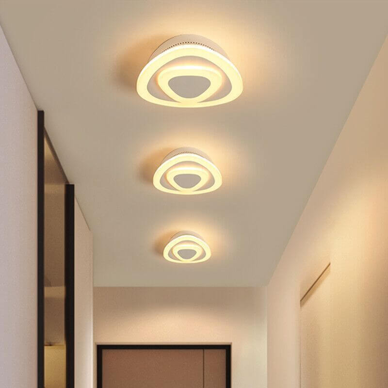 Elegant LED Surface-Mounted Ceiling Lamp in modern hallway lighting setting showcasing minimalist design & soft illumination.