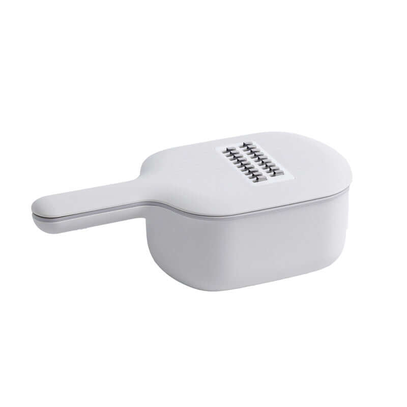 Vegetable Cutter & Slicer with grater attachment on white background