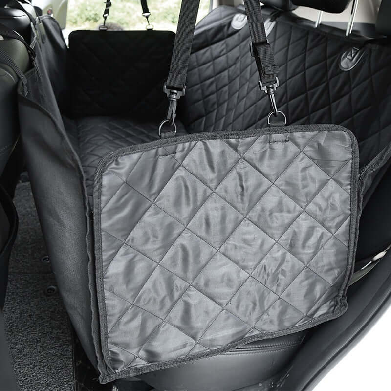 Waterproof Pet Car Seat Cushion installed in car, showcasing quilted design and secure fit for safe pet travel.